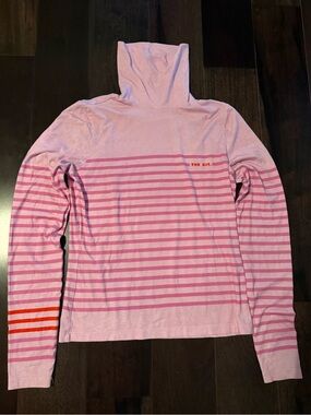 The Kit  pink turtleneck